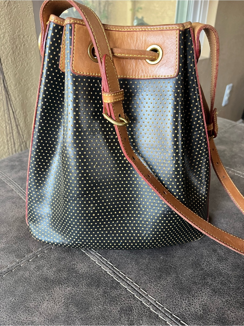 Dooney & Bourke-Vintage Black and Tan Drawstring Bucket Bag with Gold Studs - Picture 3 of 10
